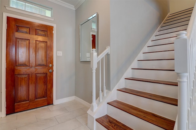 5339 Canyon Hollow Dr, Houston, TX 77084 - entrance foyer with ornamental molding, stairs, light tile patterned floors, and baseboards