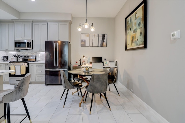 5339 Canyon Hollow Dr, Houston, TX 77084 - dining area featuring light tile patterned floors