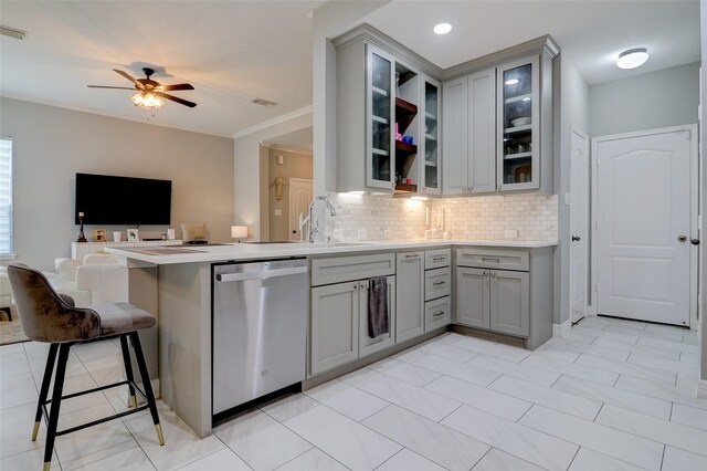 5339 Canyon Hollow Dr, Houston, TX 77084 - kitchen with gray cabinets, dishwasher, open floor plan, a peninsula, and a ceiling fan