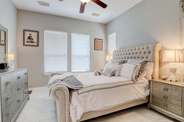 5339 Canyon Hollow Dr, Houston, TX 77084 - bedroom featuring multiple windows, ceiling fan, and baseboards