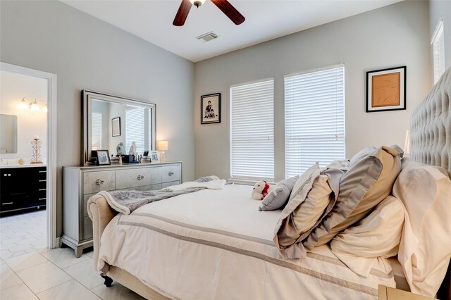 5339 Canyon Hollow Dr, Houston, TX 77084 - bedroom with ceiling fan, light tile patterned floors, and ensuite bathroom