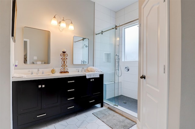 5339 Canyon Hollow Dr, Houston, TX 77084 - bathroom featuring a shower stall, double vanity, and tile patterned flooring