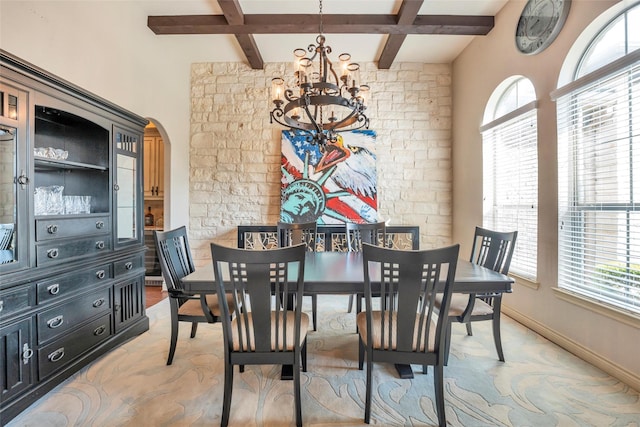 40610 Ithaca Ln, Magnolia, TX 77354 - dining area with a chandelier, arched walkways, beam ceiling, coffered ceiling, and baseboards