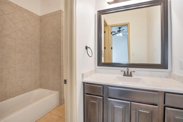 40610 Ithaca Ln, Magnolia, TX 77354 - bathroom with vanity, tile patterned flooring,  shower combination, and a ceiling fan