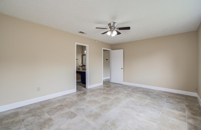 18011 Glenledi Dr, Houston, TX 77084 - empty room featuring a ceiling fan and baseboards