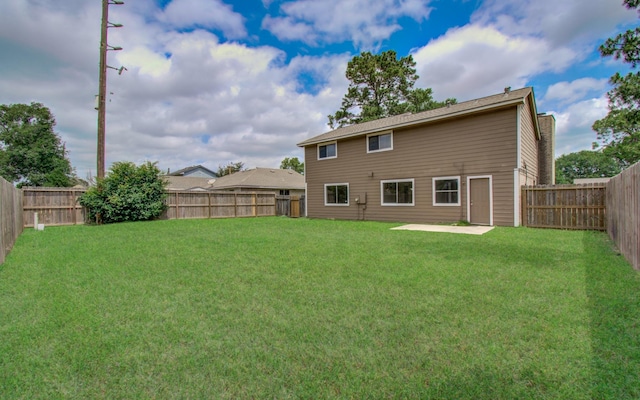 18011 Glenledi Dr, Houston, TX 77084 - rear view of house with a patio area