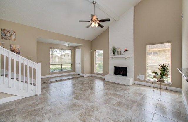 18011 Glenledi Dr, Houston, TX 77084 - unfurnished living room with baseboards, high vaulted ceiling, a fireplace, ceiling fan, and beam ceiling