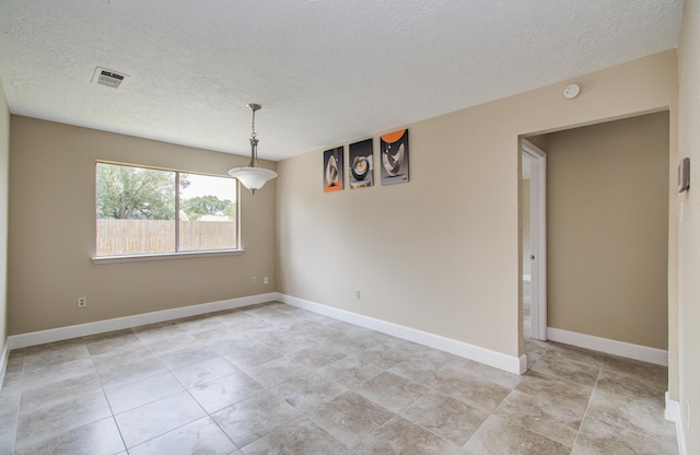 18011 Glenledi Dr, Houston, TX 77084 - unfurnished room with a textured ceiling and baseboards
