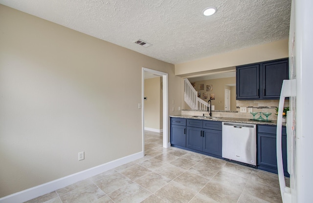 18011 Glenledi Dr, Houston, TX 77084 - kitchen with stainless steel dishwasher, a sink, baseboards, a textured ceiling, and light stone countertops