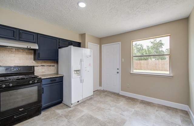 18011 Glenledi Dr, Houston, TX 77084 - kitchen featuring black range with gas stovetop, white fridge with ice dispenser, under cabinet range hood, decorative backsplash, and baseboards