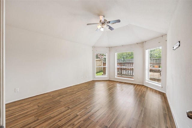 31827 Oak Thicket Ct, Conroe, TX 77385 - empty room with ceiling fan, wood finished floors, and lofted ceiling
