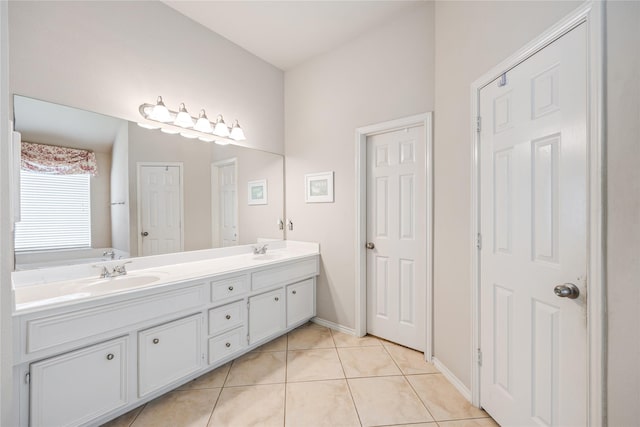 31827 Oak Thicket Ct, Conroe, TX 77385 - full bathroom featuring double vanity and tile patterned flooring