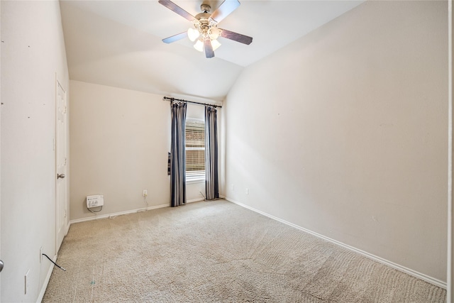 31827 Oak Thicket Ct, Conroe, TX 77385 - empty room featuring vaulted ceiling, ceiling fan, and carpet floors