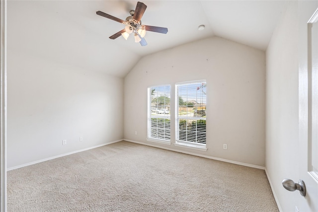 31827 Oak Thicket Ct, Conroe, TX 77385 - empty room with carpet flooring, vaulted ceiling, and a ceiling fan