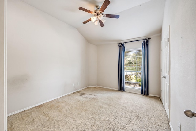 31827 Oak Thicket Ct, Conroe, TX 77385 - unfurnished room with vaulted ceiling, carpet floors, and a ceiling fan