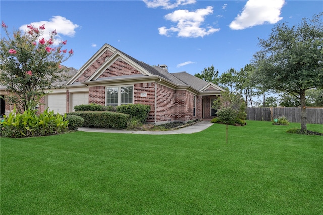 31827 Oak Thicket Ct, Conroe, TX 77385 - view of front of house featuring brick siding and an attached garage