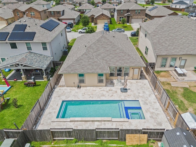 13030 Larriston Ln, Houston, TX 77044 - view of pool with a residential view, a pool with connected hot tub, and a patio area