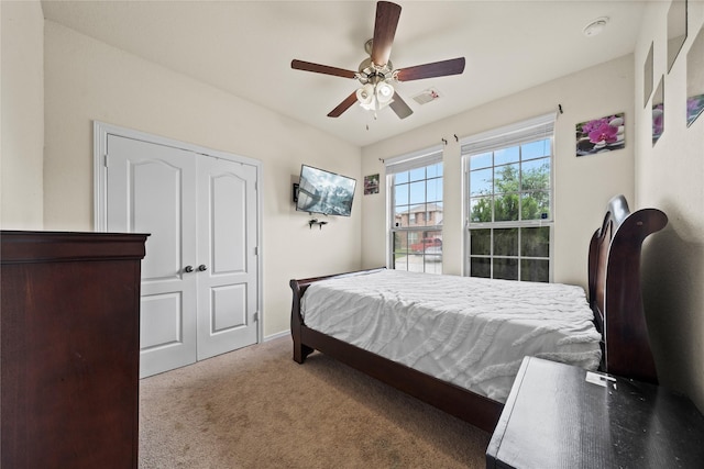 13030 Larriston Ln, Houston, TX 77044 - carpeted bedroom with ceiling fan and baseboards