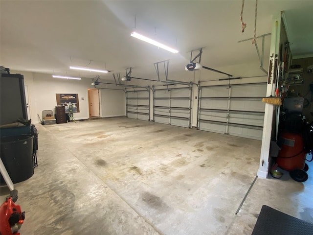 216 Dewberry Dr, Lake Jackson, TX 77566 - garage with a garage door opener