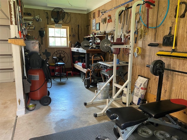 216 Dewberry Dr, Lake Jackson, TX 77566 - workout room featuring a workshop area and crown molding