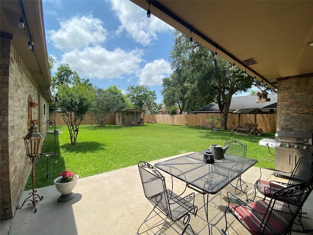216 Dewberry Dr, Lake Jackson, TX 77566 - view of patio with grilling area