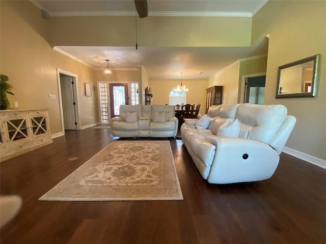 216 Dewberry Dr, Lake Jackson, TX 77566 - living room with dark wood-type flooring, baseboards, ornamental molding, and a chandelier