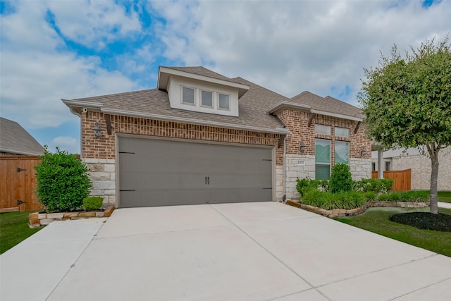 10615 Winding Arbor Ct, Cypress, TX 77433 - view of front of house featuring stone siding, a shingled roof, concrete driveway, and brick siding