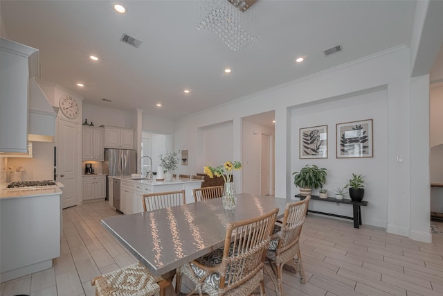 10615 Winding Arbor Ct, Cypress, TX 77433 - dining area with crown molding, recessed lighting, and a chandelier