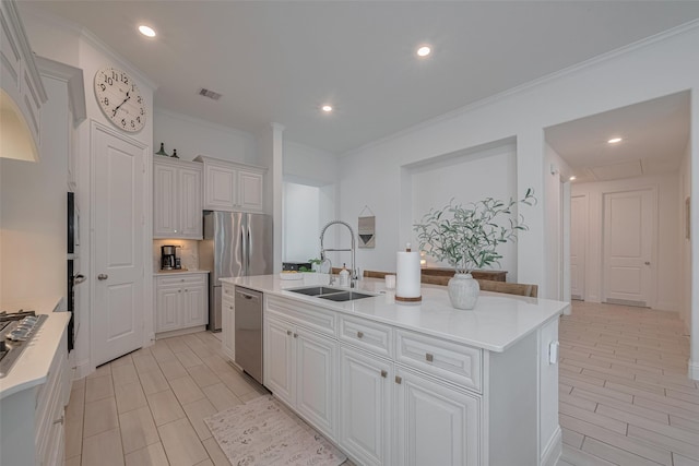 10615 Winding Arbor Ct, Cypress, TX 77433 - kitchen with stainless steel dishwasher, a sink, light countertops, a kitchen island with sink, and recessed lighting