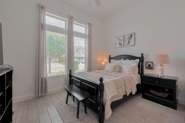 10615 Winding Arbor Ct, Cypress, TX 77433 - bedroom with baseboards and a ceiling fan