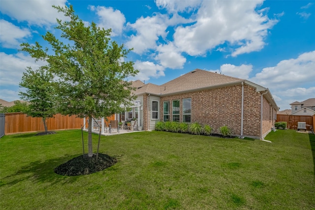 10615 Winding Arbor Ct, Cypress, TX 77433 - rear view of house with brick siding, a patio area, and cooling unit