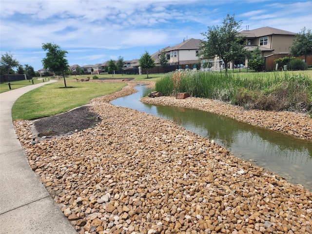 10615 Winding Arbor Ct, Cypress, TX 77433 - surrounding community featuring a residential view and a water view