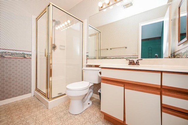 2910 Grants Lake Blvd Unit 1205, Sugar Land, TX 77479 - bathroom with a shower stall, toilet, vanity, wallpapered walls, and tile patterned floors