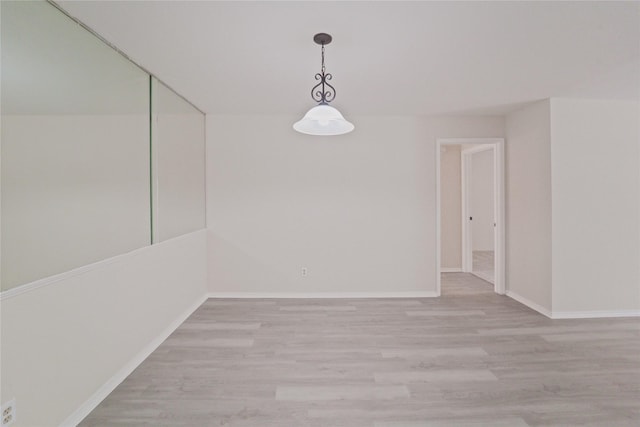 9700 Leawood Blvd Unit 406, Houston, TX 77099 - unfurnished room with wood finished floors and baseboards