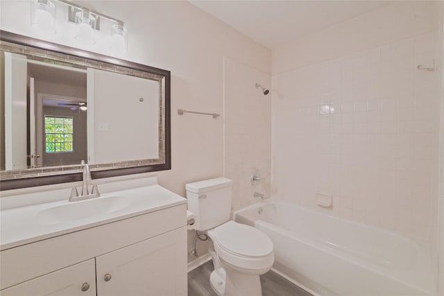 9700 Leawood Blvd Unit 406, Houston, TX 77099 - full bathroom featuring toilet, washtub / shower combination, vanity, and a ceiling fan