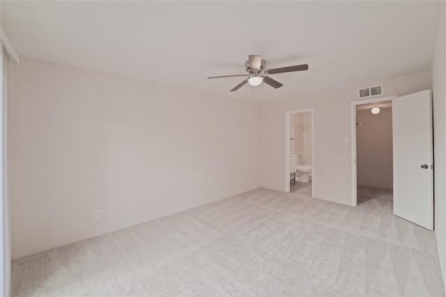 9700 Leawood Blvd Unit 406, Houston, TX 77099 - unfurnished bedroom featuring light colored carpet, ensuite bath, and a ceiling fan