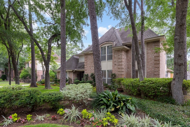 14010 Court Of Regents, Houston, TX 77069 - view of front facade with brick siding and a shingled roof