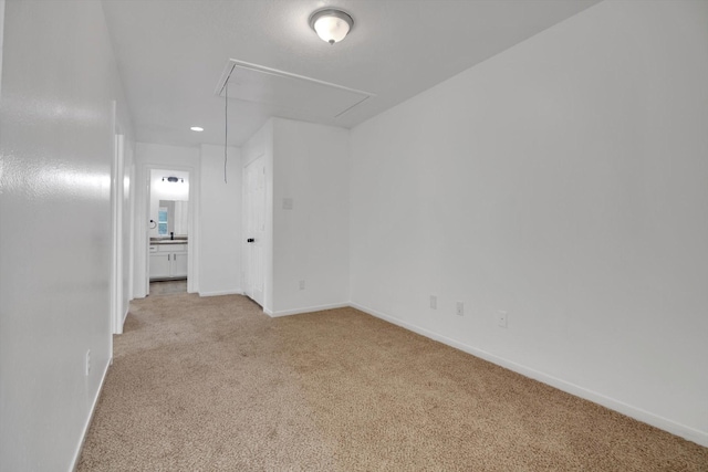 6933 Liverpool St, Houston, TX 77021 - carpeted empty room featuring attic access and baseboards
