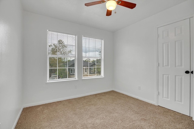 6933 Liverpool St, Houston, TX 77021 - carpeted spare room with a ceiling fan and baseboards