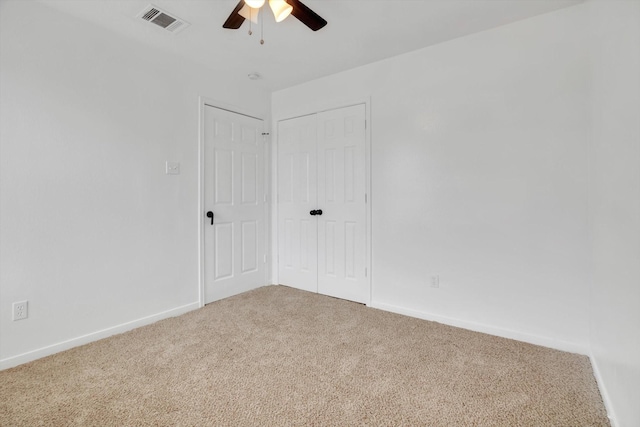 6933 Liverpool St, Houston, TX 77021 - empty room featuring a ceiling fan, carpet floors, and baseboards