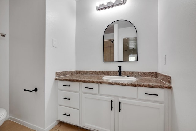 6933 Liverpool St, Houston, TX 77021 - bathroom featuring vanity, toilet, and tile patterned flooring