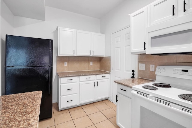 6933 Liverpool St, Houston, TX 77021 - kitchen with white appliances, white cabinetry, light tile patterned floors, backsplash, and light stone countertops