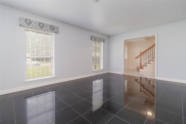 1918 Thousand Pines Dr, Houston, TX 77339 - empty room with stairway, crown molding, and dark tile patterned floors