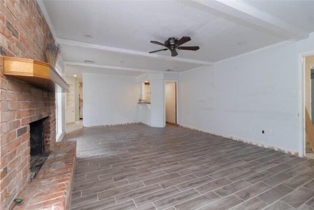 1918 Thousand Pines Dr, Houston, TX 77339 - unfurnished living room featuring a ceiling fan, ornamental molding, a brick fireplace, and wood finished floors