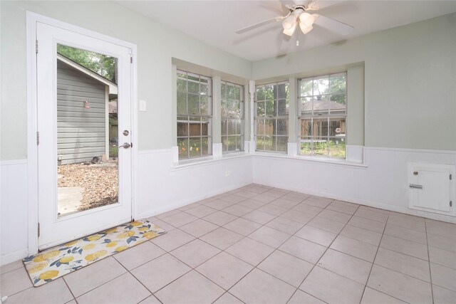 1918 Thousand Pines Dr, Houston, TX 77339 - unfurnished sunroom with a wainscoted wall and tile patterned flooring