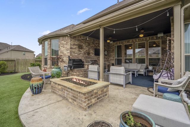 28203 Middlewater View Ln, Katy, TX 77494 - view of patio / terrace with ceiling fan and an outdoor living space with a fire pit