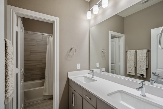 28203 Middlewater View Ln, Katy, TX 77494 - bathroom featuring double vanity and shower / tub combo with curtain