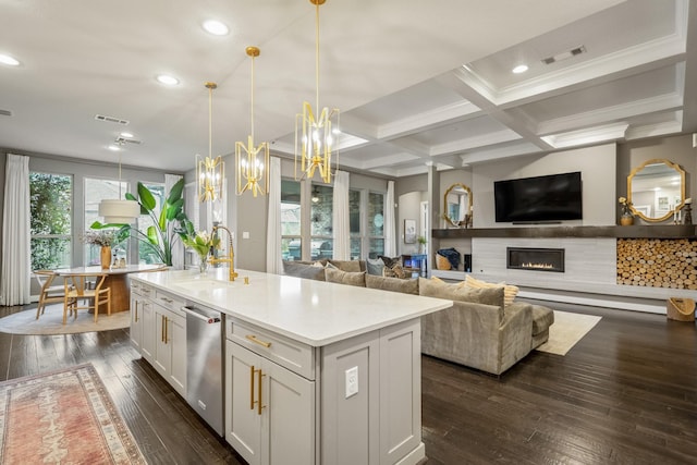 28203 Middlewater View Ln, Katy, TX 77494 - kitchen with a sink, recessed lighting, dark wood-type flooring, a chandelier, and open floor plan