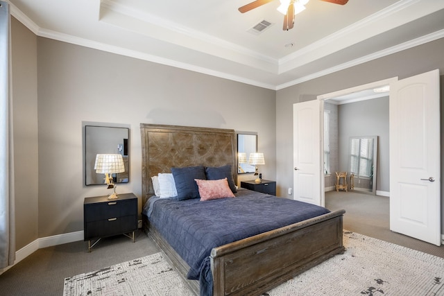 28203 Middlewater View Ln, Katy, TX 77494 - bedroom featuring light colored carpet, a raised ceiling, ornamental molding, baseboards, and ceiling fan
