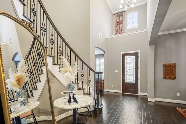 28203 Middlewater View Ln, Katy, TX 77494 - entryway featuring healthy amount of natural light, dark wood-type flooring, baseboards, a towering ceiling, and ornamental molding